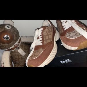 Coach tennis shoes. Slightly worn.